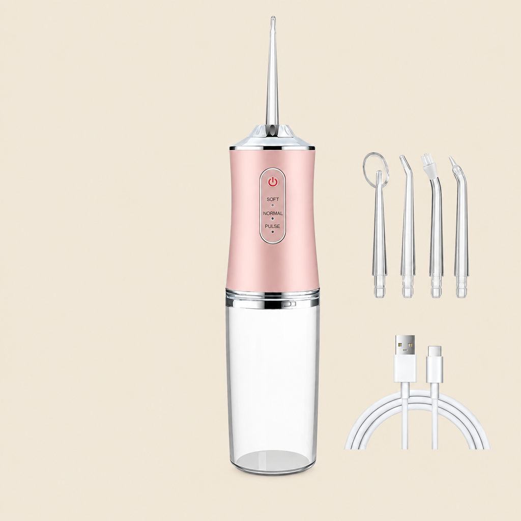 Pink water flosser with four jet tips and USB-C cable